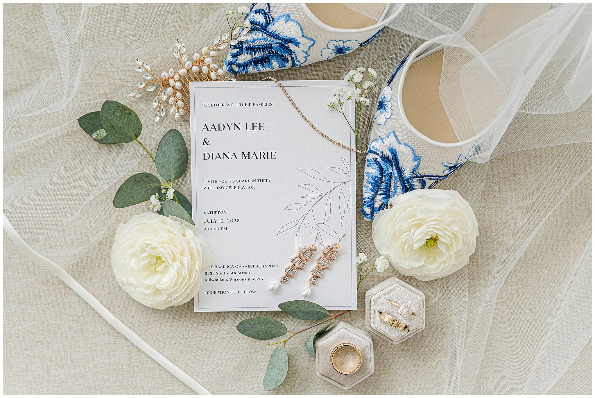 A perfectly curated bridal detail image with wedding invitation, shoes, jewelry and florals taken by Taylor Kelley Photography a Milwaukee wedding photographer.